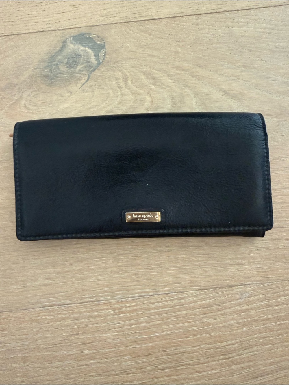 kate spade Black Leather Slim Continental Wallet with Gold Logo, never been used
